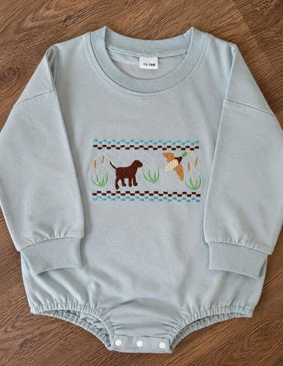 Chocolate lab and duck long sleeve onesie